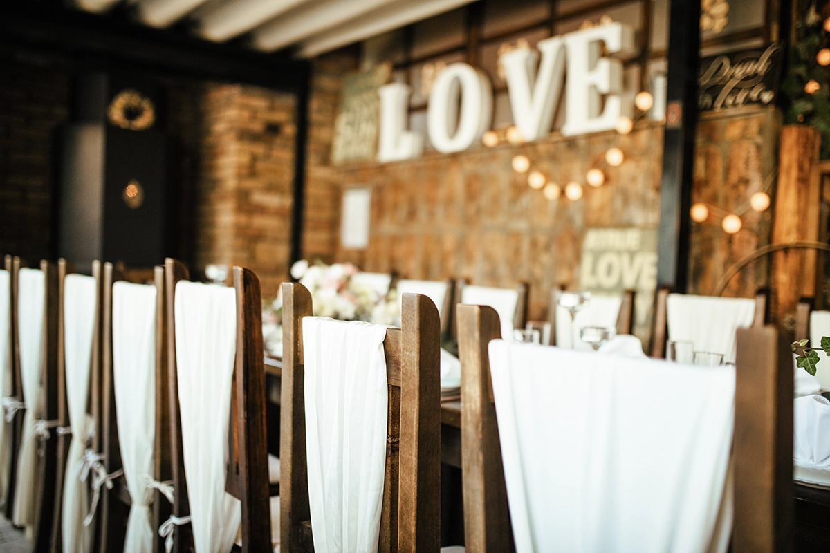 wedding reception chairs and signage
